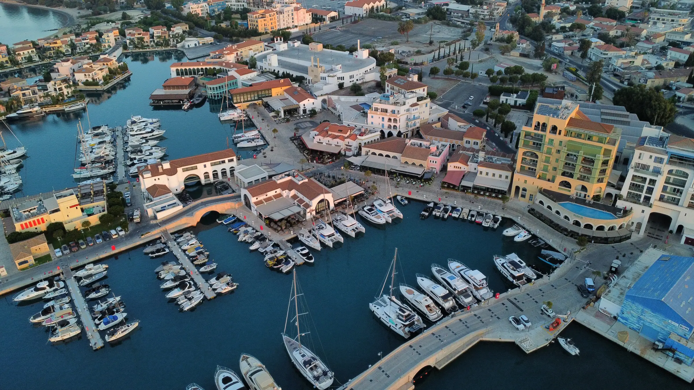 Aerial view of Limassol Marina village, quays and moored yachts